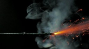 stock-footage-igniting-a-dynamite-fuse-with-a-match-close-up-p-e1333973037788